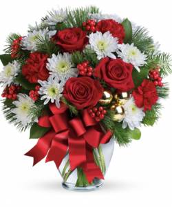 red roses with white daisies and greens in vase with red bow