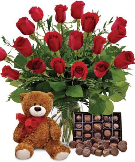 The complete package! What better gift to give the one you love, than the "Hopeless Romantic" Roses (18), chocolates and a bear too, sure to let your love one know just how much you care about them!